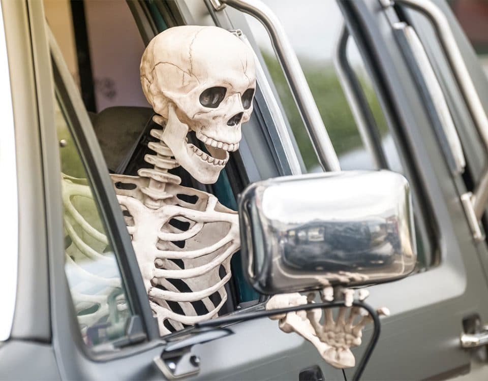 fake skeleton driving a truck
